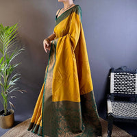 Elegant Yellow Silk Saree With Gold Zari Motifs